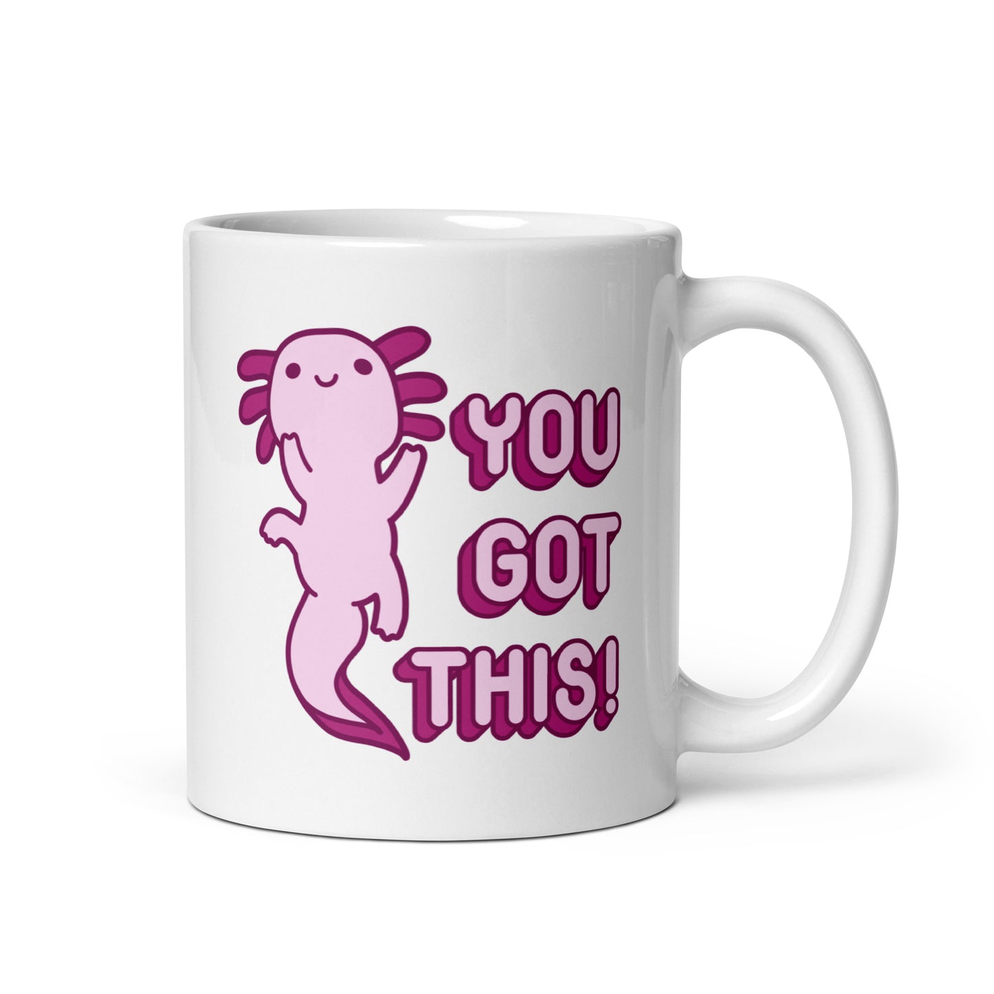 An 11oz white coffee mug with the handle on the right-hand side with a picture of a pink axolotl and the words "You Got This!" in pink bubble letters