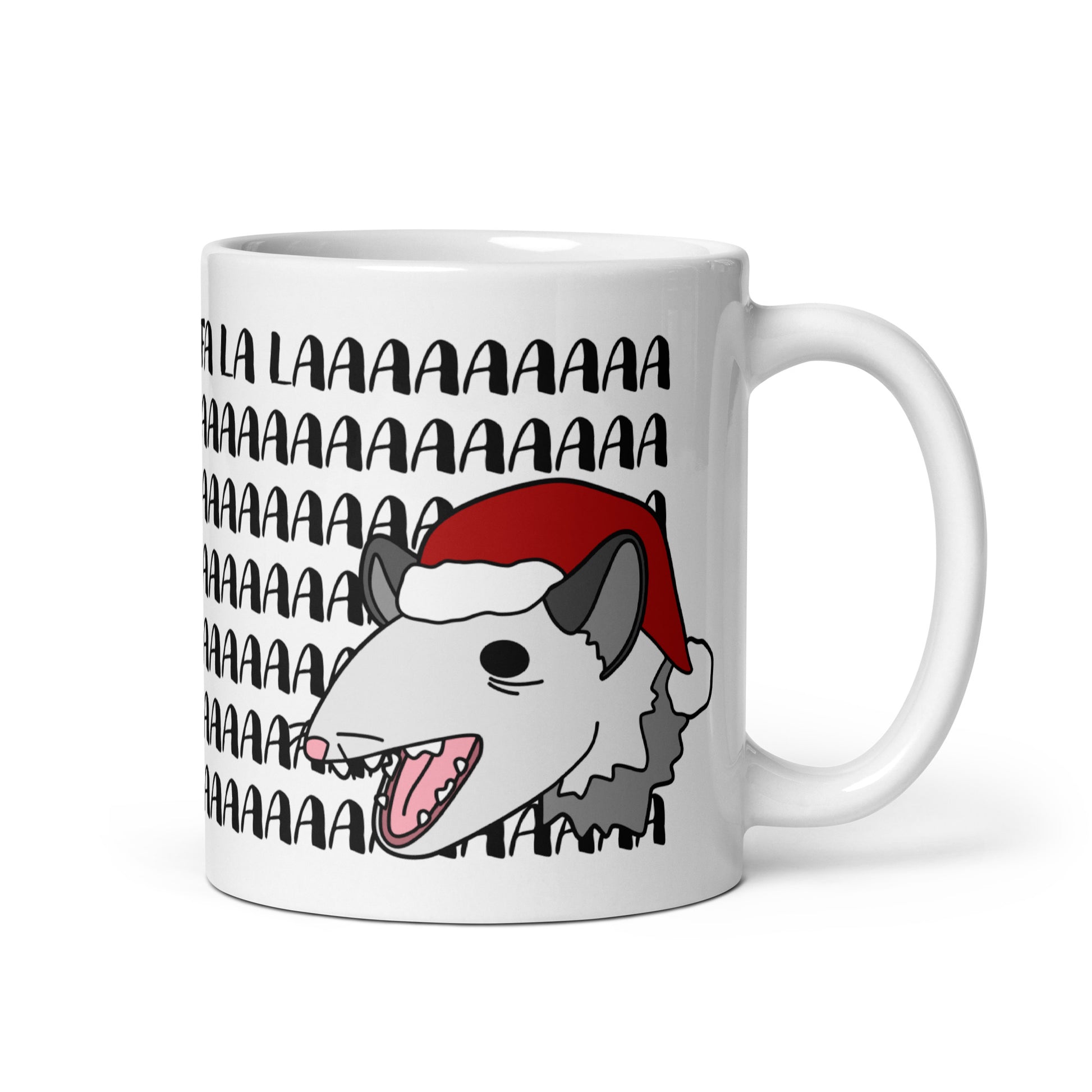 A white 11 ounce mug featuring an illustration of a possum wearing a Santa hat. The possum appears to be screaming, and text behind his head reads "FA LA LAAAAAA"