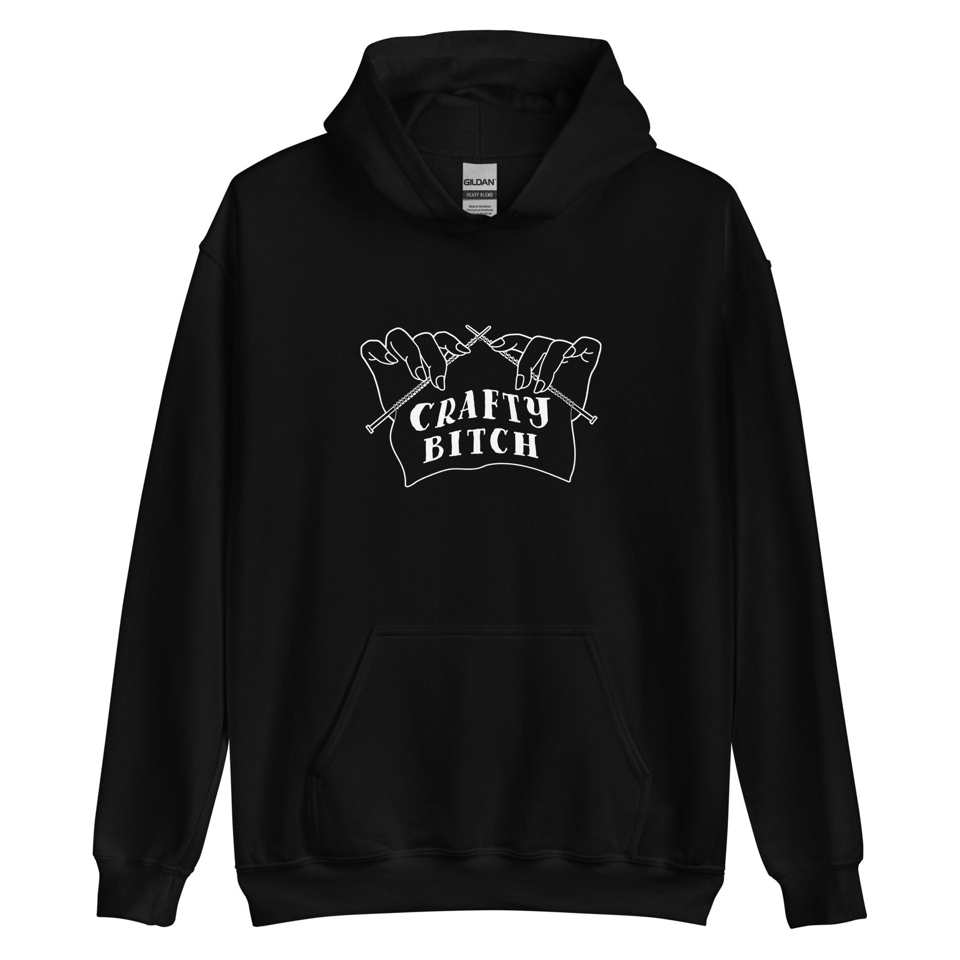 A black hooded sweatshirt featuring a single-color illustration of a pair of hands holding knitting needles. Fabric on the needles features text that reads "crafty bitch".