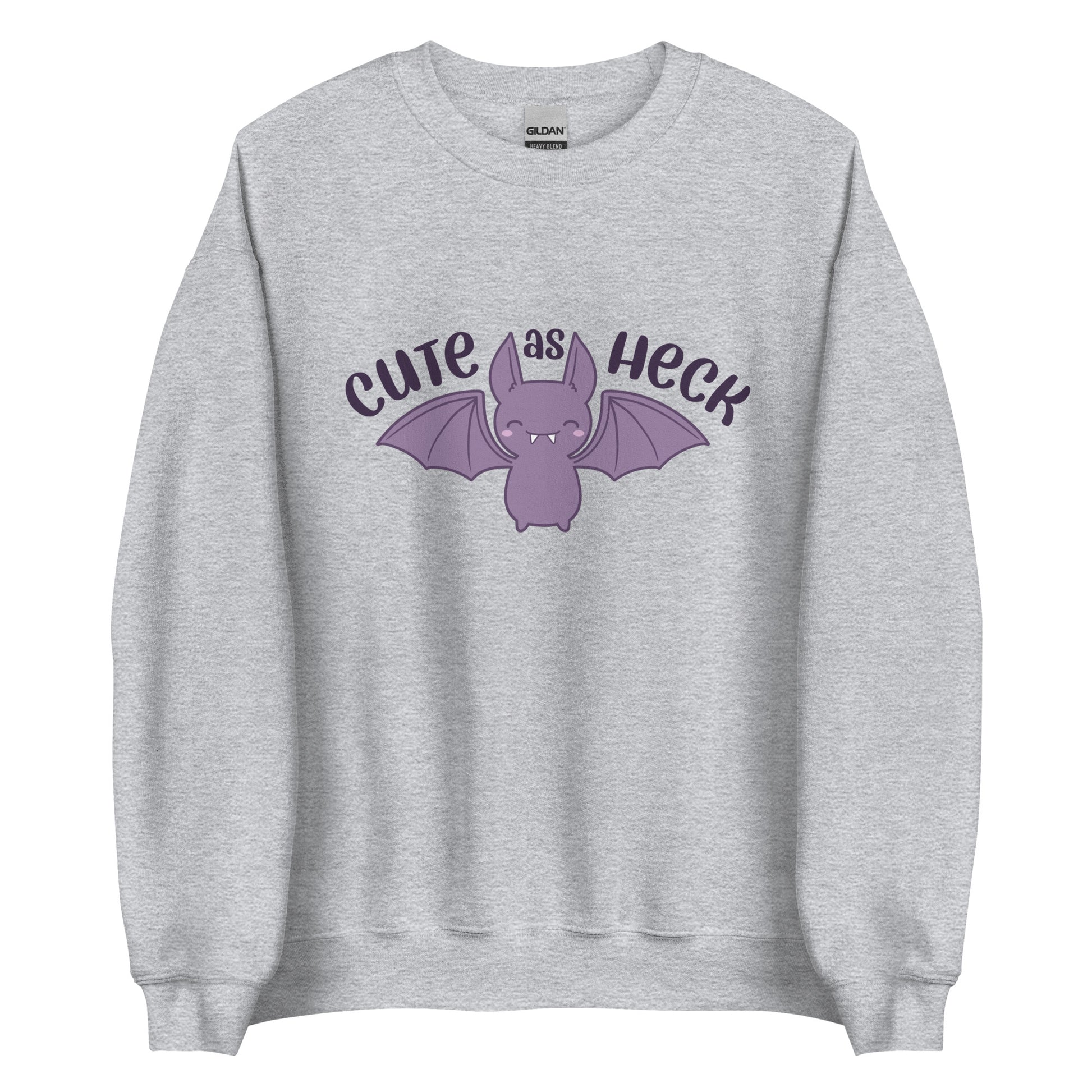 A grey crewneck sweatshirt featuring a smiling purple bat and text reading "Cute As Heck"