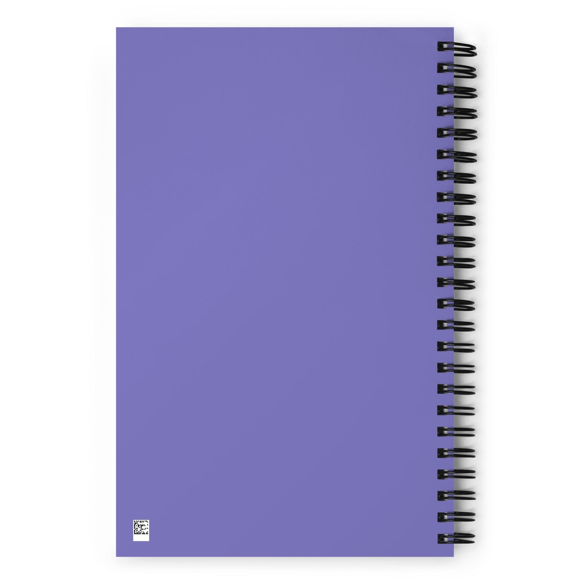 The back of a purple, wire-bound notebook.