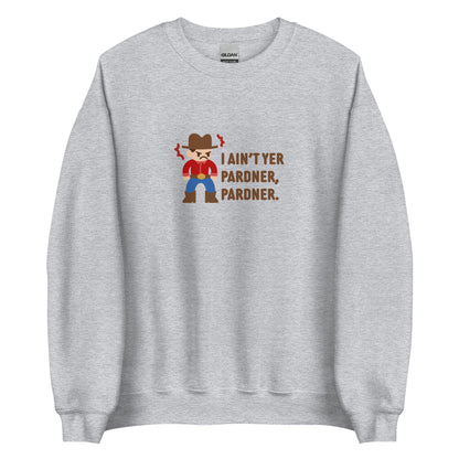 A grey crewneck sweatshirt featuring an illustration of a grumpy cowboy wearing a red shirt. Text beneath the cowboy reads "I ain't yer pardner, pardner."