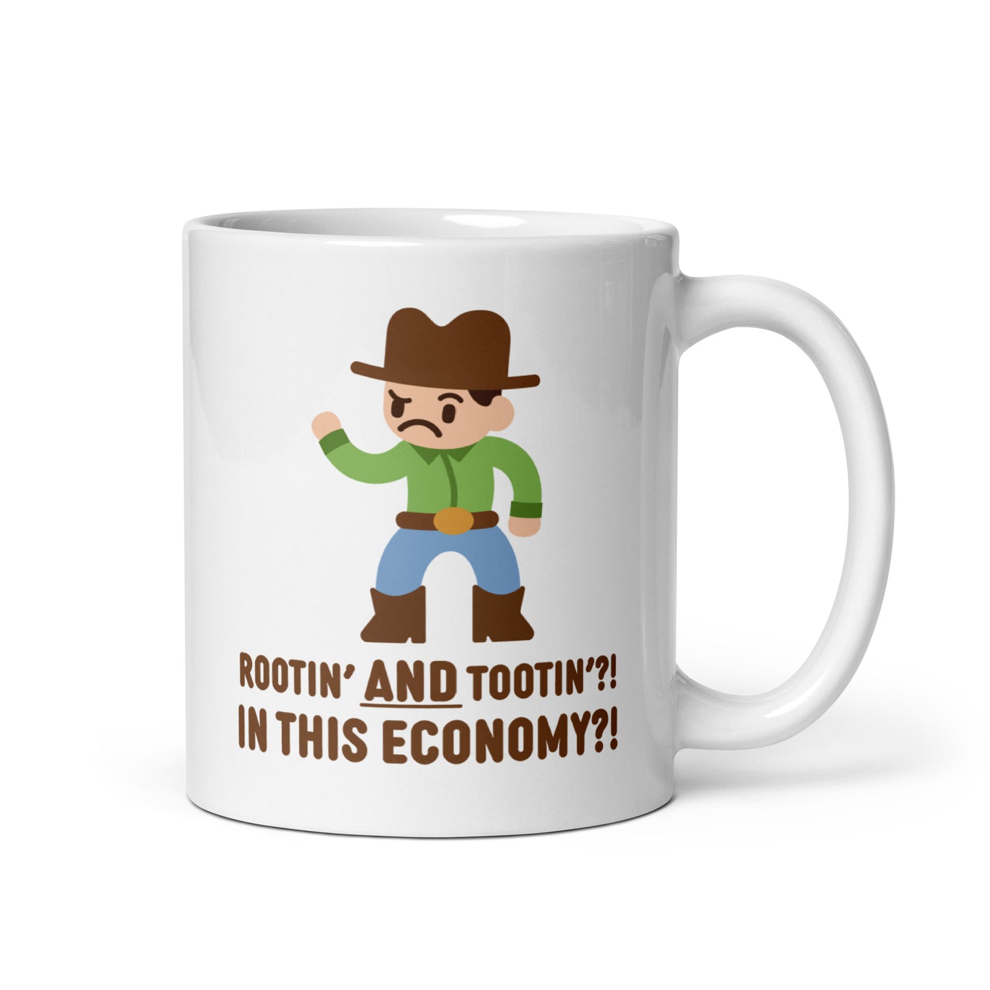 A white 11 ounce ceramic coffee mug featuring an illustration of a confused-looking cowboy wearing a green shirt. Text underneath the cowboy reads "Rootin' AND tootin'?! In this economy?!"