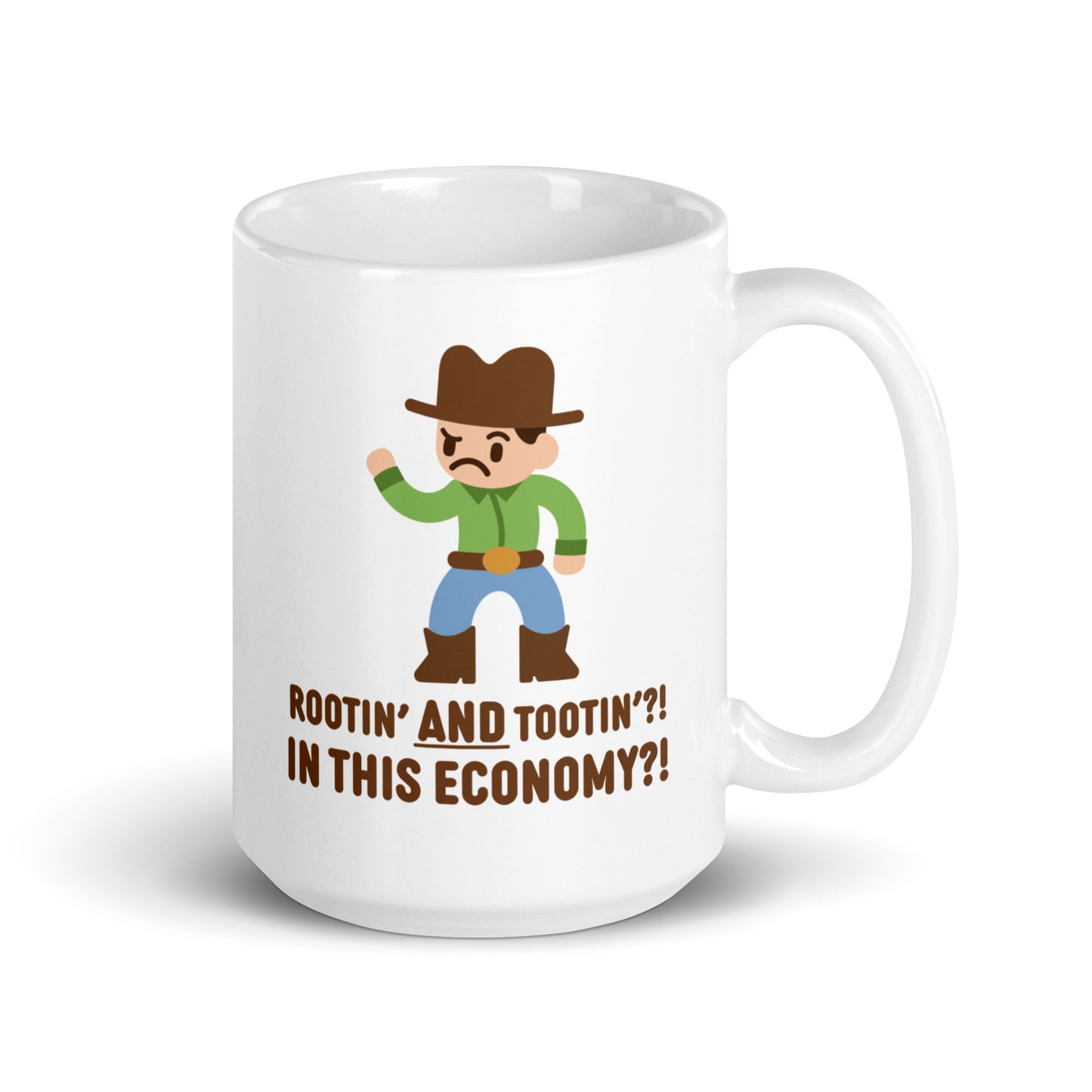 A white 15 ounce ceramic coffee mug featuring an illustration of a confused-looking cowboy wearing a green shirt. Text underneath the cowboy reads "Rootin' AND tootin'?! In this economy?!"