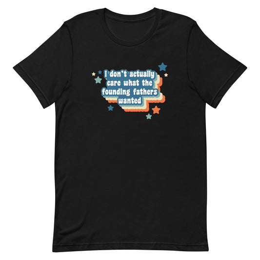 A black crewneck t-shirt featuring text that reads "I don't actually care what the founding fathers wanted". Stars and a colorful drop shadow surround the text.