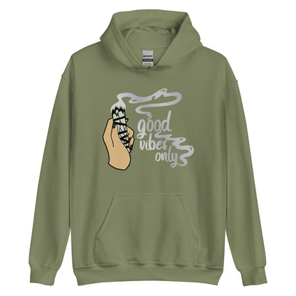 An olive green hooded sweatshirt with graphic of a hand holding sage smudge stick and text reading "Good Vibes only"
