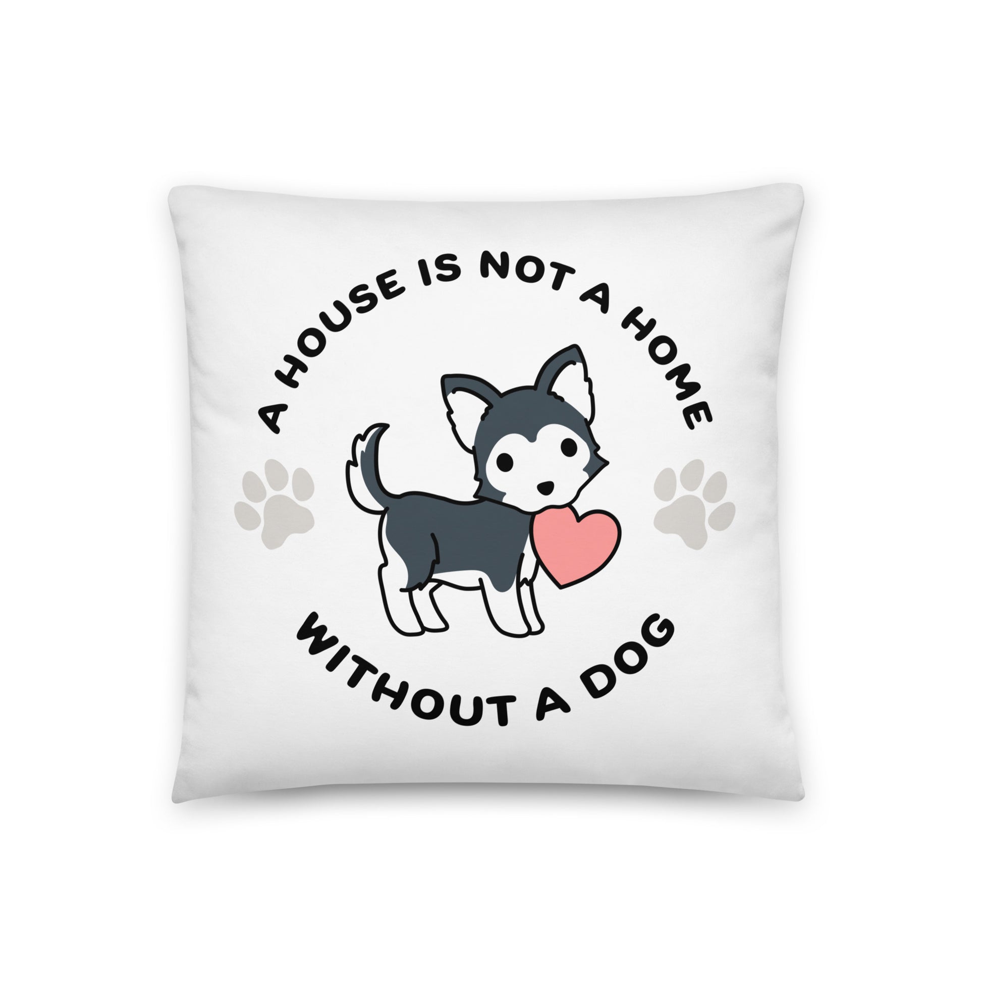 A white, 18" x 18" pillow featuing a cute, stylized illustration of a Husky holding a heart in its mouth. Text in a circle around the dog reads "A house is not a home without a dog"