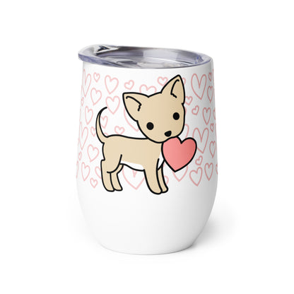 A white metal wine tumbler with a plastic lid. A pattern of hearts wraps around the top half of the tumbler. Centered on the tumbler is a cute, stylized illustration of a Chihuahua