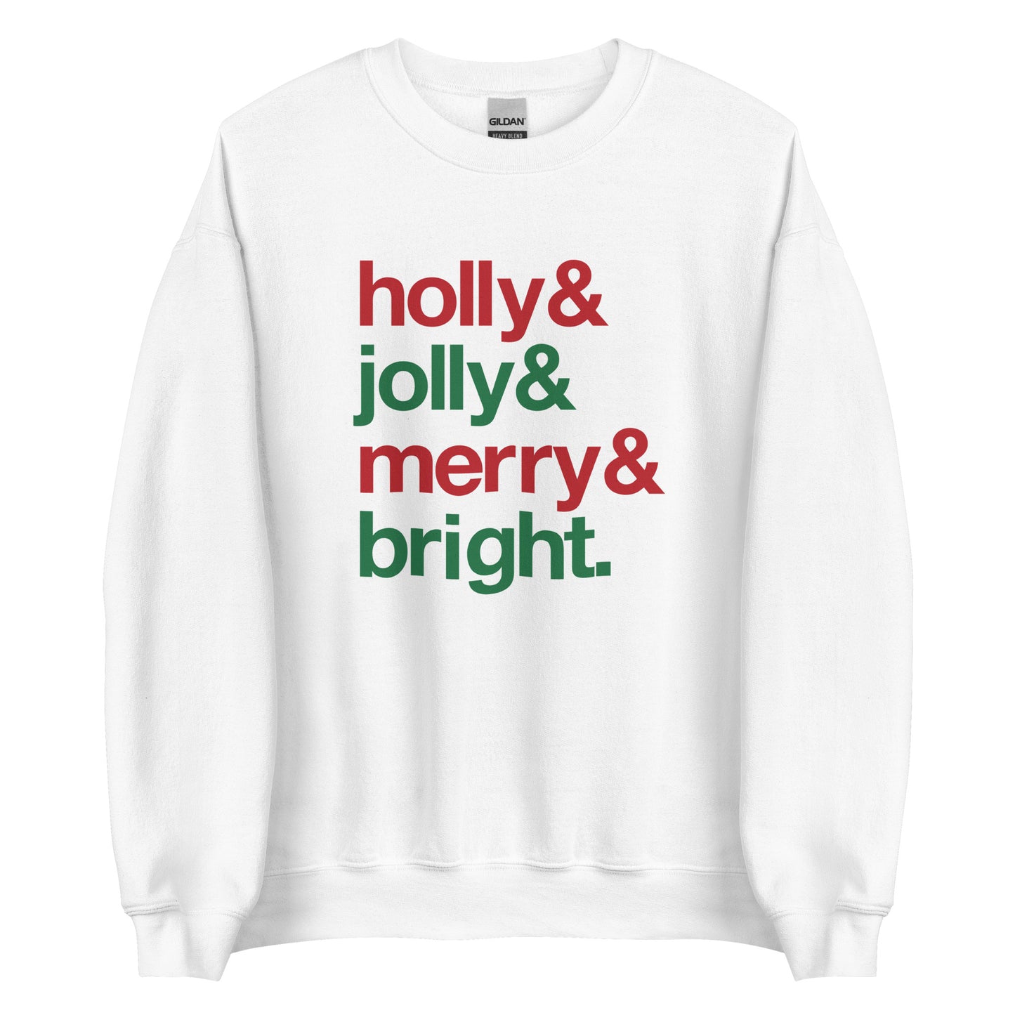 A white crewneck sweatshirt featuring four lines of red & green text that read "Holly & jolly & merry & bright"