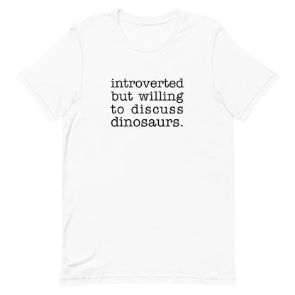 A white crewneck t-shirt with black text reading "introverted but willing to discuss dinosaurs"