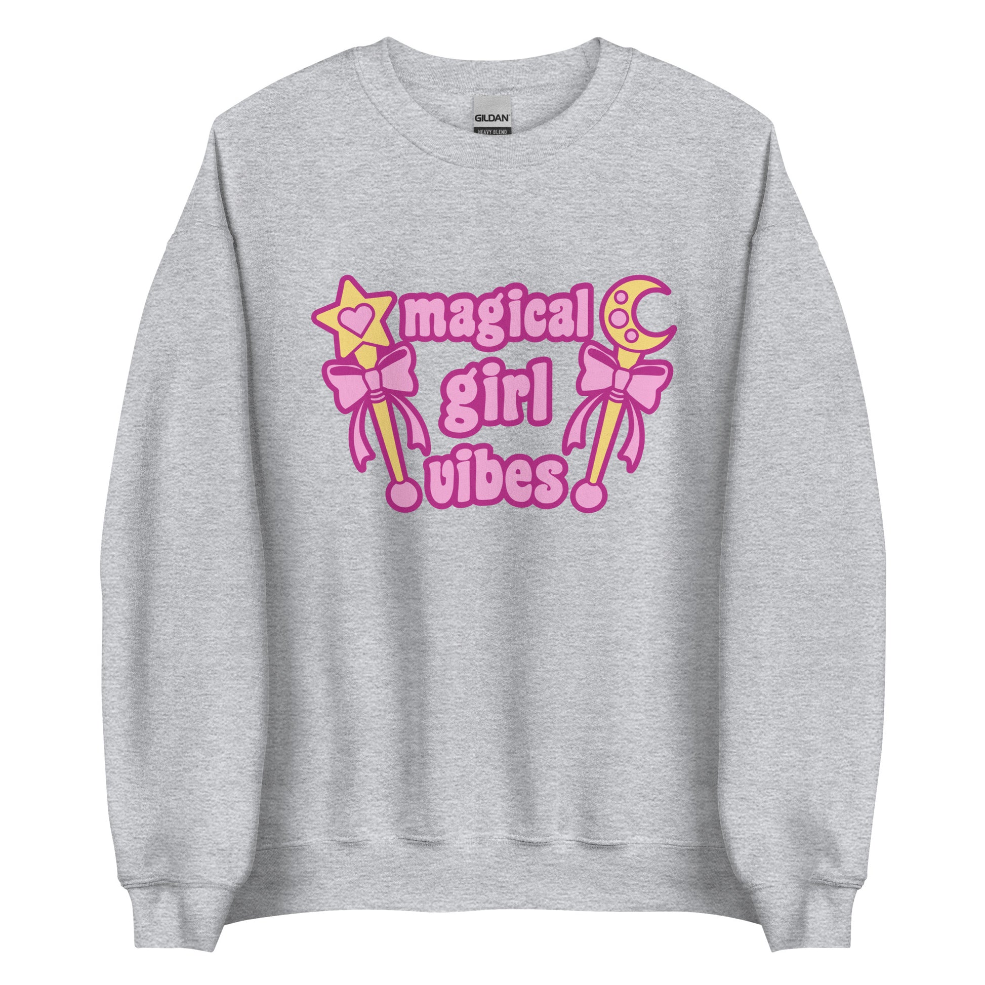 A heathered grey crewneck sweatshirt featuring two gold wands with pink bows and pink text reading "Magical girl vibes"