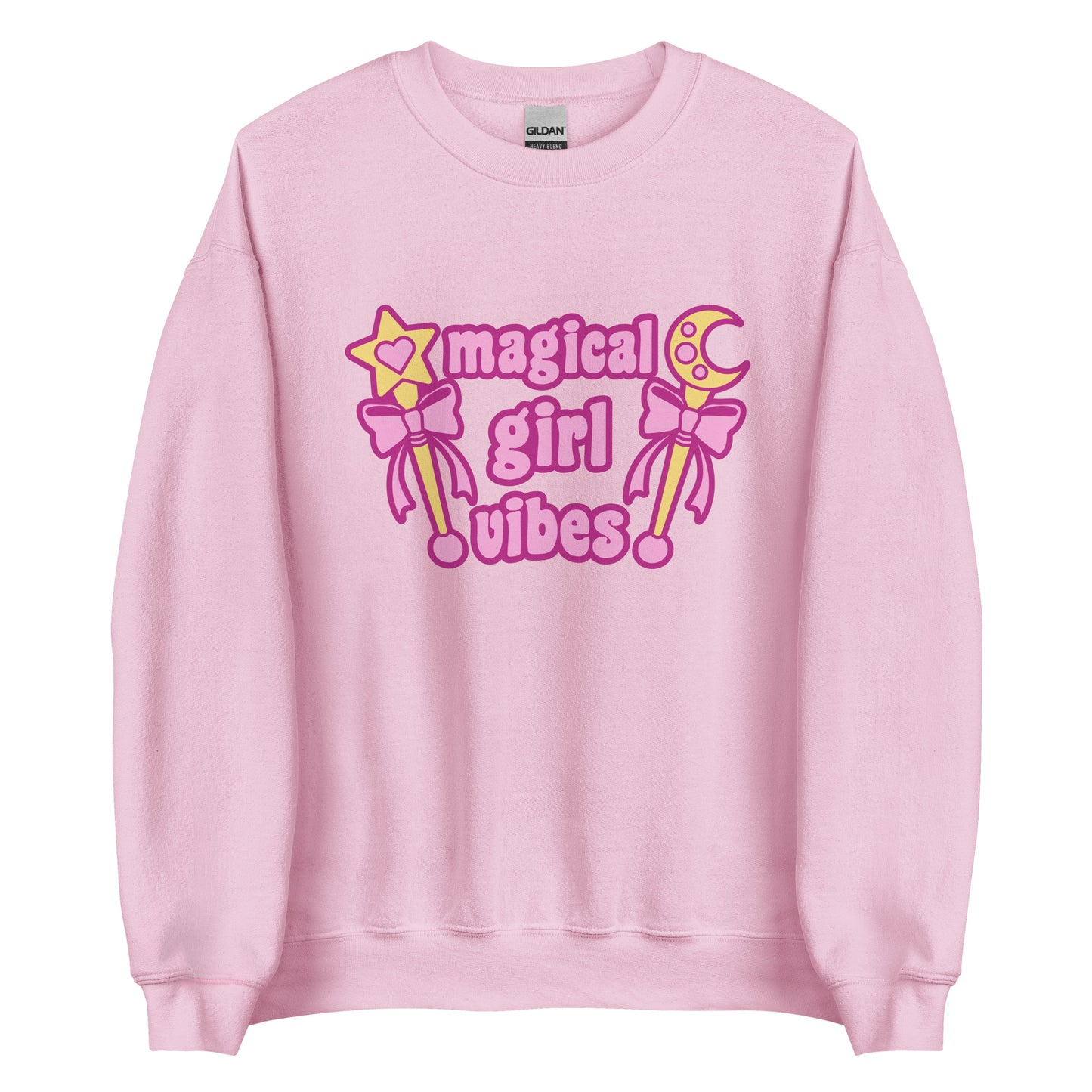 A light pink crewneck sweatshirt featuring two gold wands with pink bows and pink text reading "Magical girl vibes"