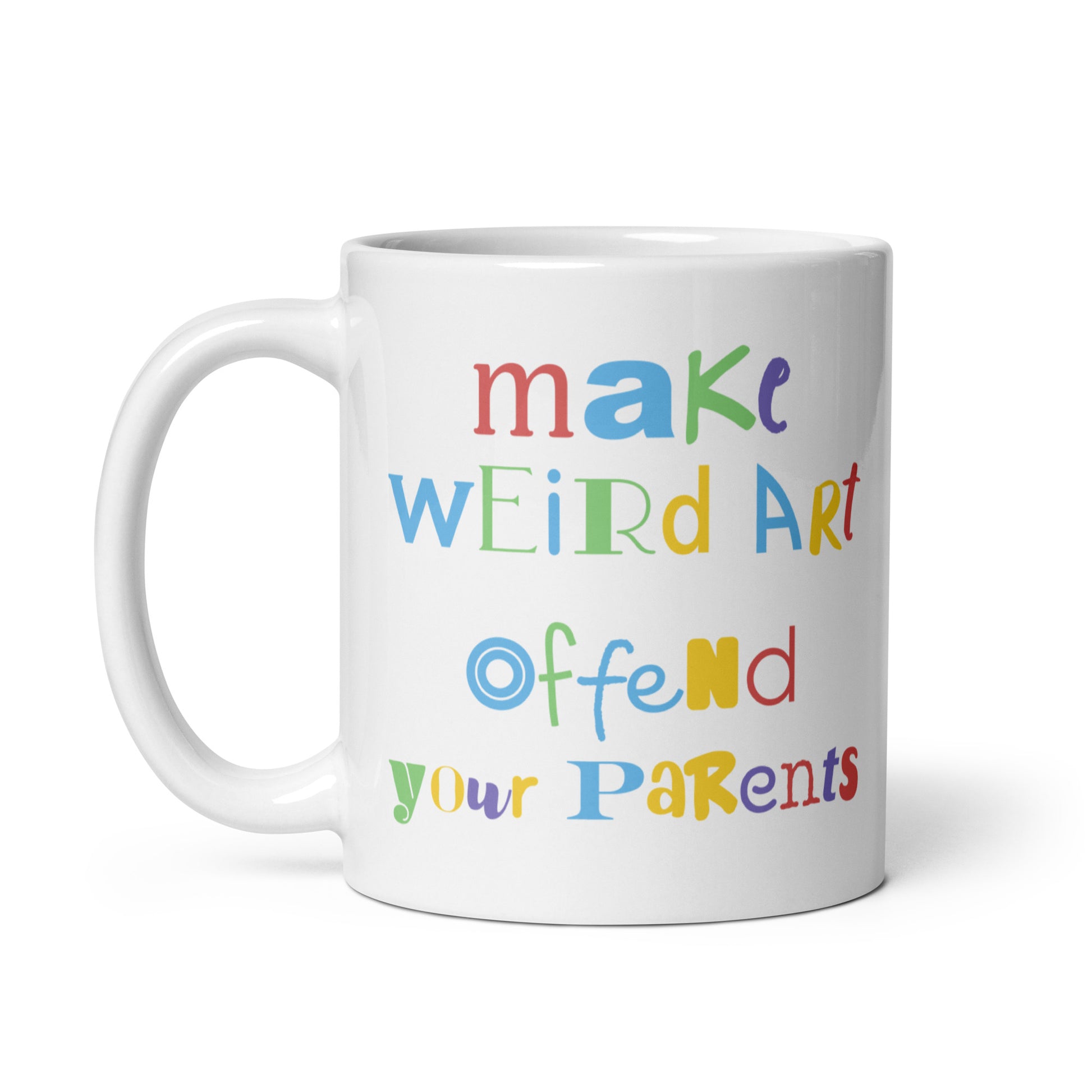 An 11 ounce white ceramic mug featuring text that reads "make weird art, offend your parents" in varying fonts and colors
