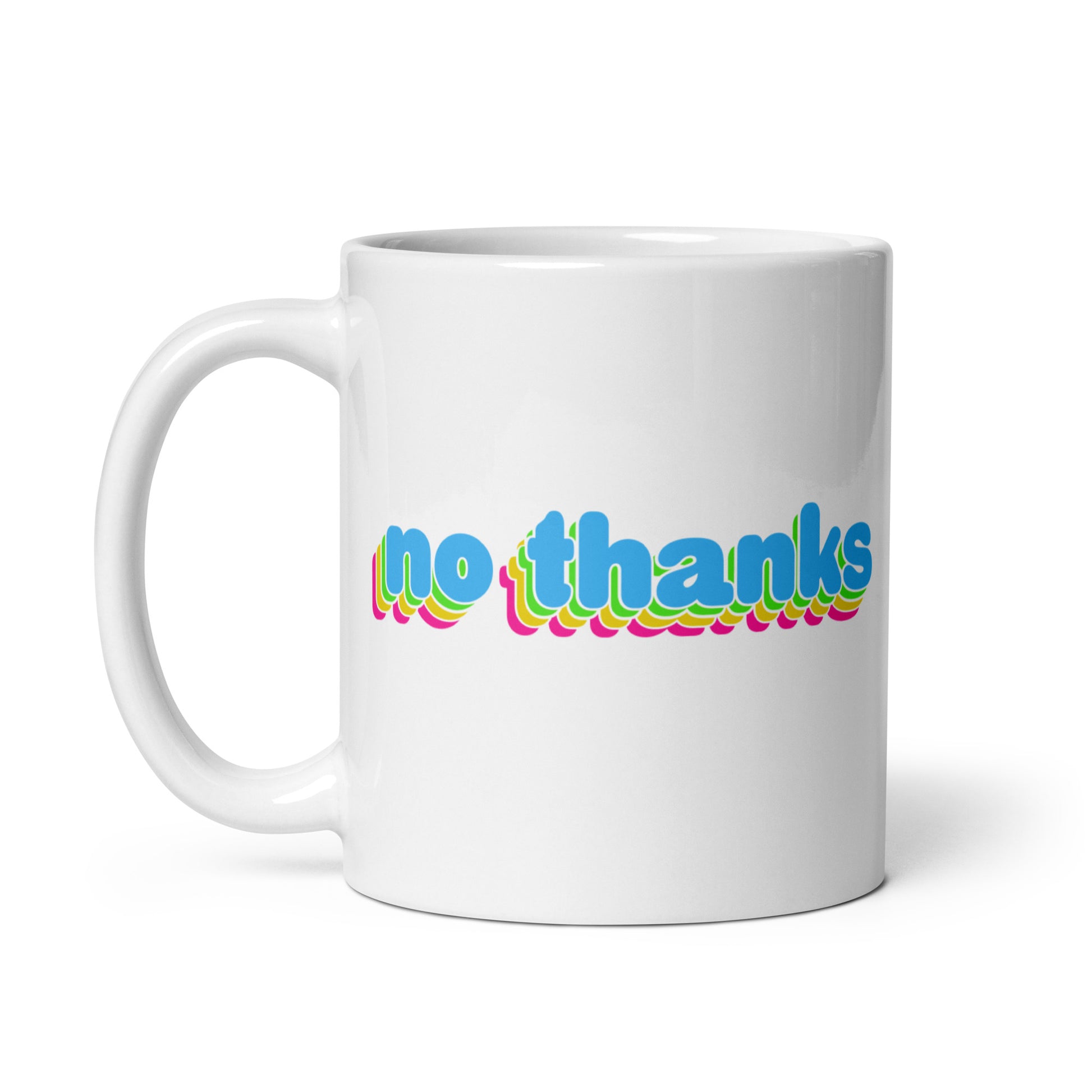 A white 11 oz ceramic mug with the handle to the left featuring colorful bubble text reading "no thanks"