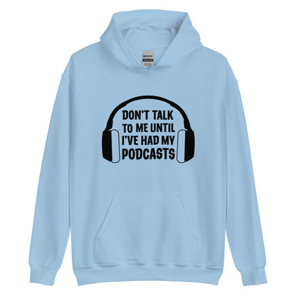 A light blue hooded sweatshirt with a picture of headphones and text reading "Don't talk to me until I've had my podcasts"