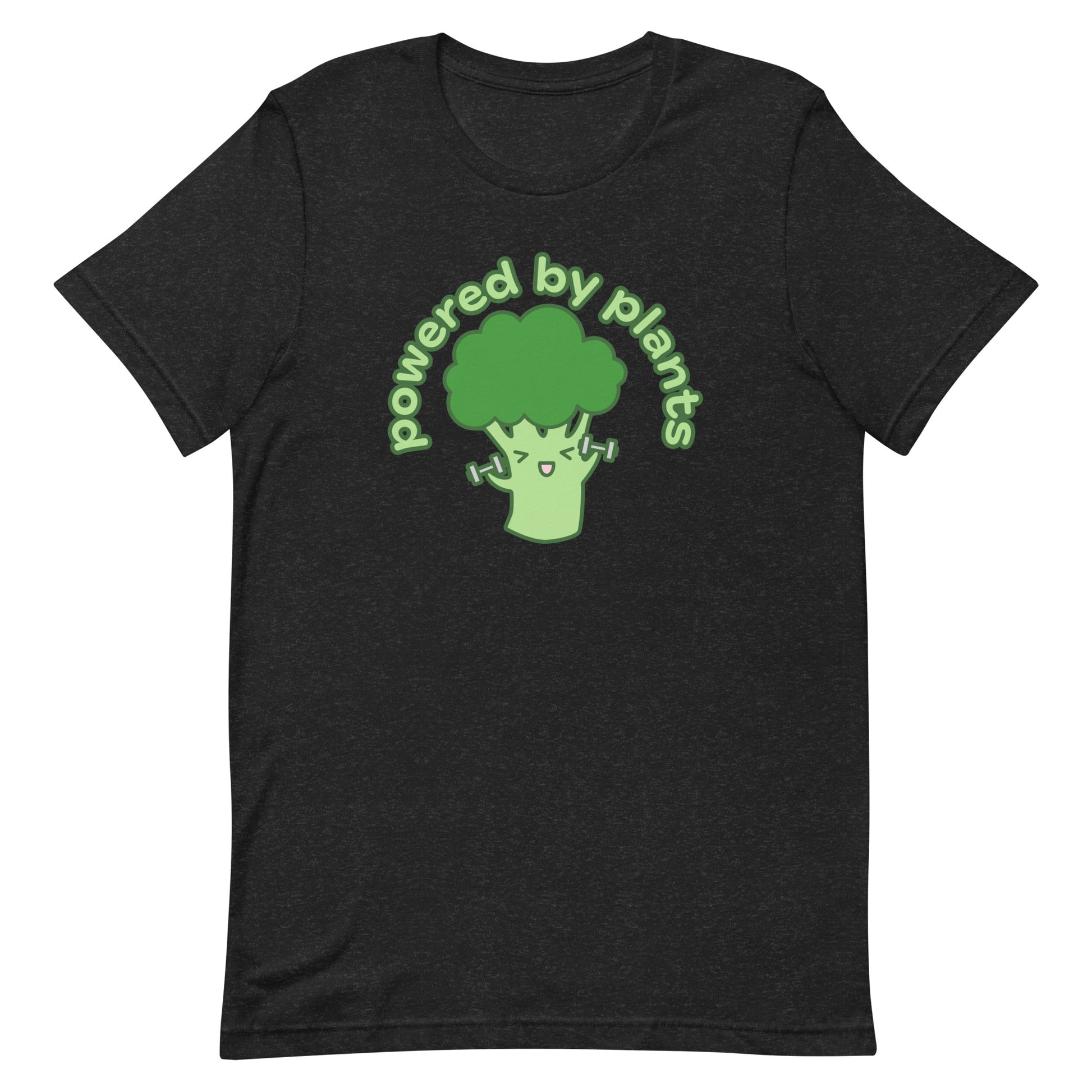 A heathered black crewneck t-shirt featuring an illustration of a cartoon broccoli character. The broccoli is excitedly lifting weights, and text in an arc above the broccoli reads "powered by plants".