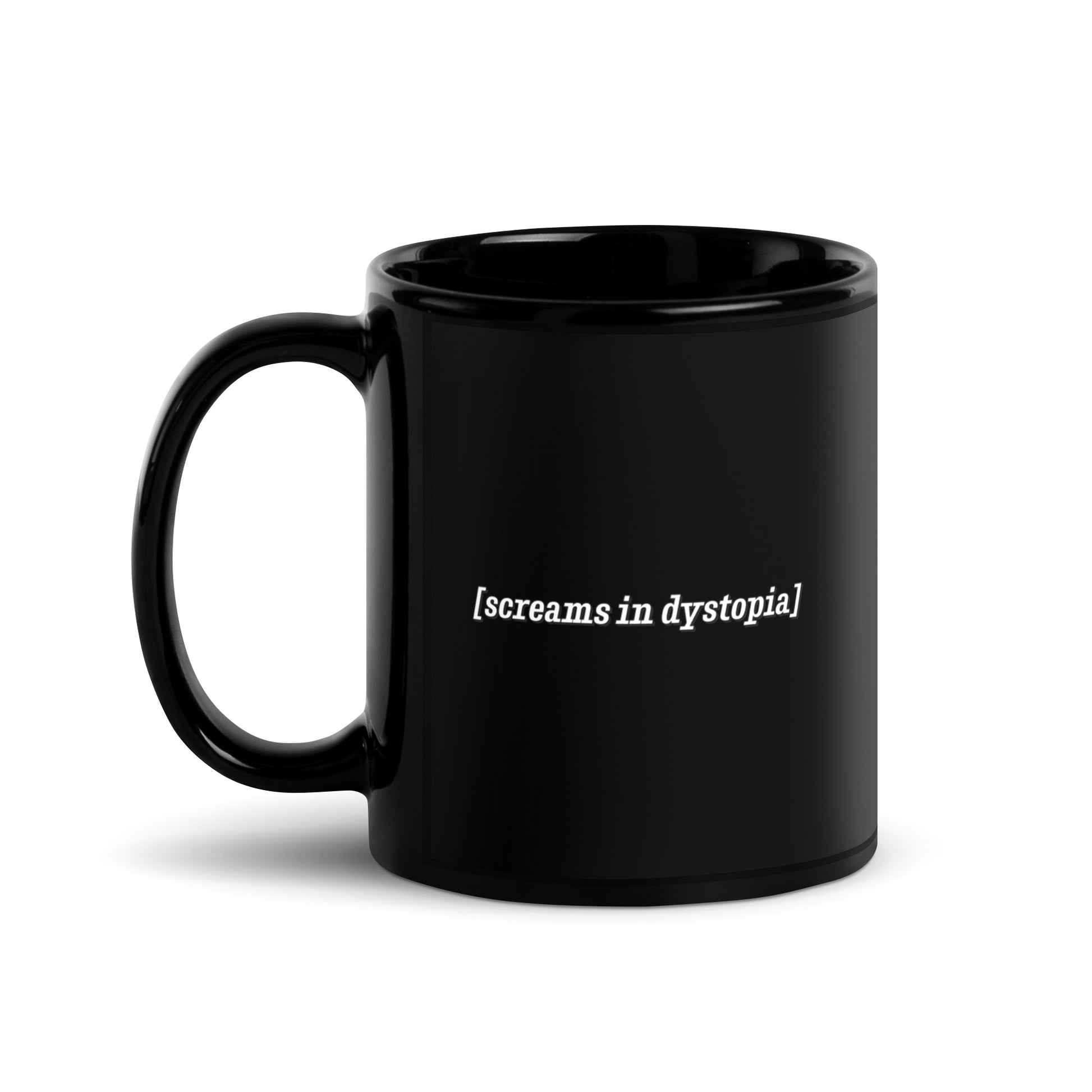 A black 11 ounce coffee mug with white text in the style of subtitles. The text reads "[screams in dystopia]".