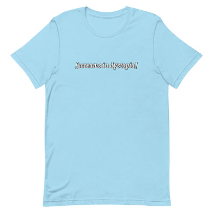 A light blue crewneck t-shirt with white text in the style of subtitles. The text reads "[screams in dystopia]".