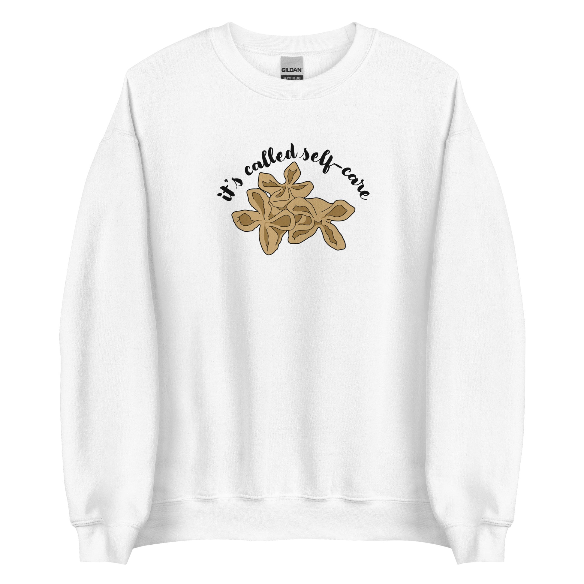 A white crewneck sweatshirt featuring an illustration of three pieces of crab rangoon. Text in an arc above the crab rangoon reads "it's called self-care" in a cursive script.