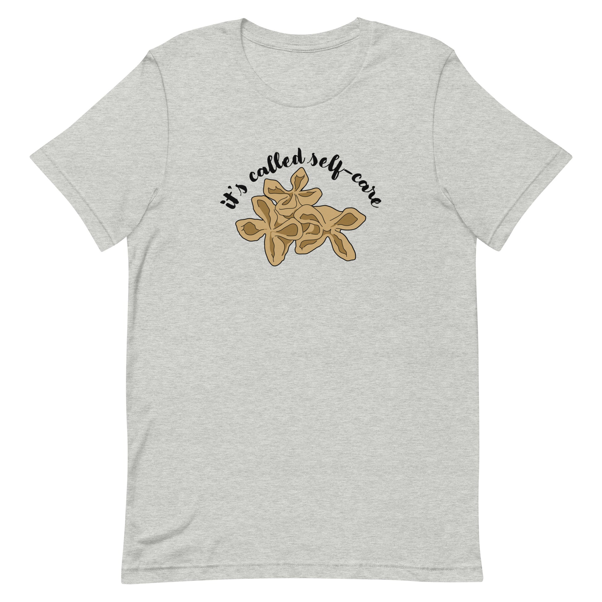 A gray crewneck t-shirt featuring an illustration of three pieces of crab rangoon. Text in an arc above the crab rangoon reads "it's called self-care" in a cursive script.