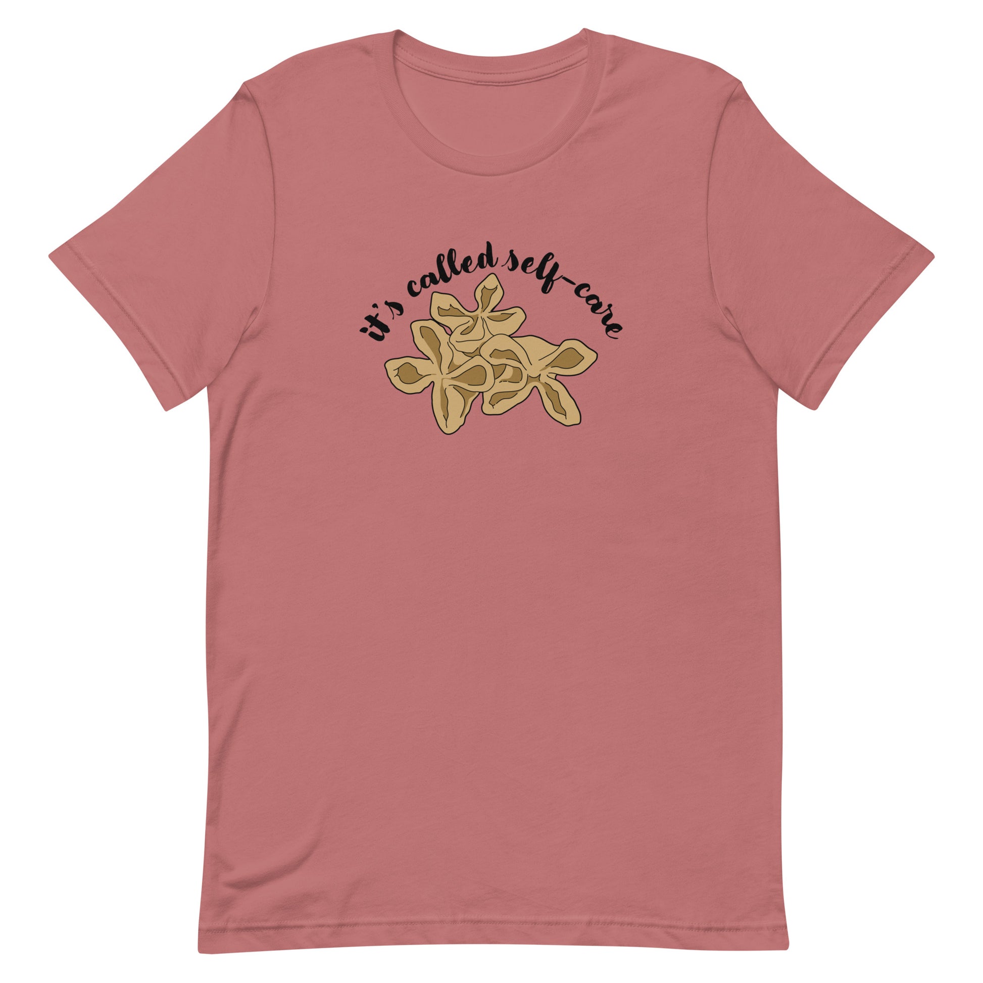A mauve crewneck t-shirt featuring an illustration of three pieces of crab rangoon. Text in an arc above the crab rangoon reads "it's called self-care" in a cursive script.