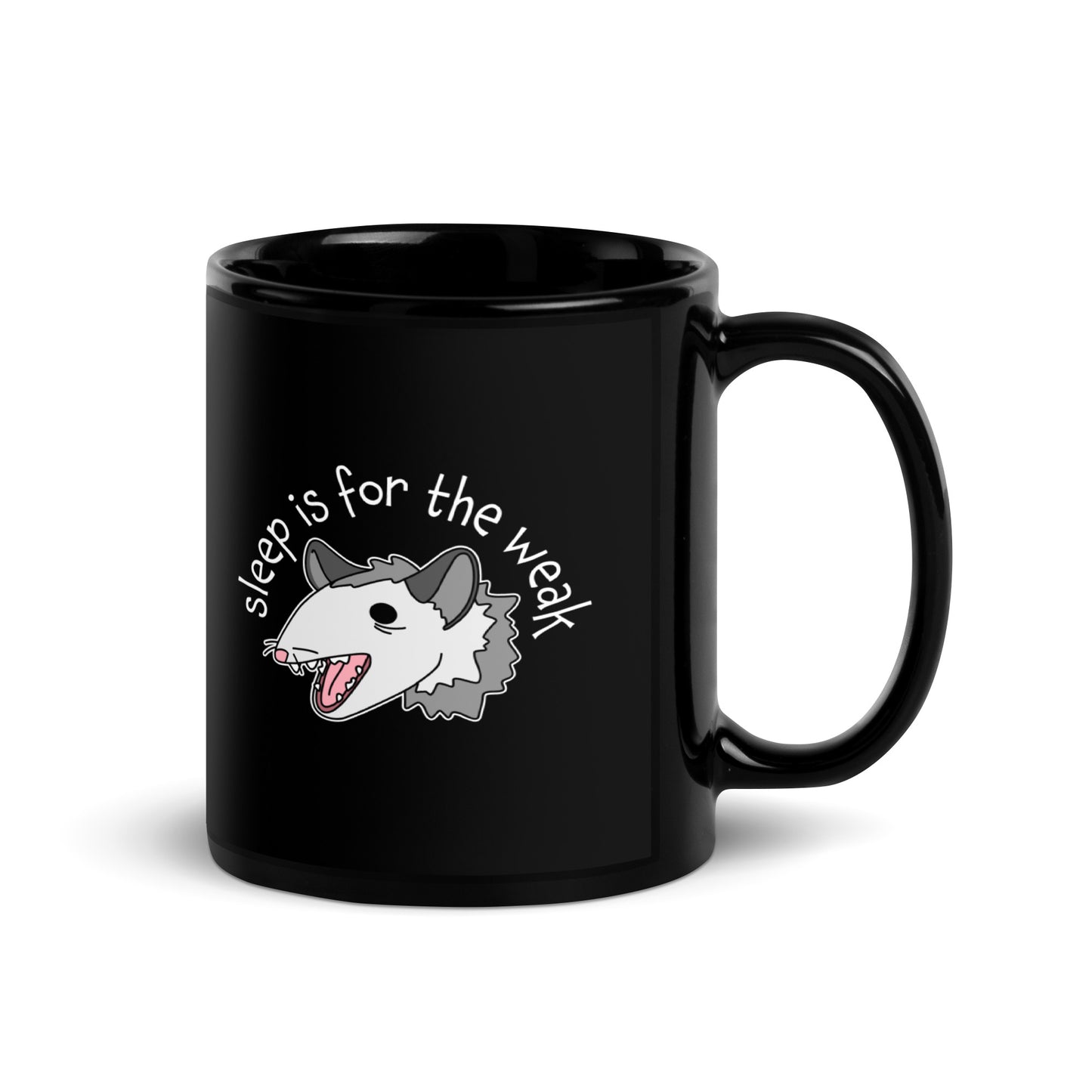 A black 11 ounce ceramic coffee mug featuring an illustration of an opossum with its mouth open, as if it was yelling. Text arching above the opossum reads "sleep is for the weak"