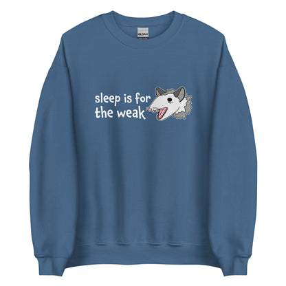 A blue crewneck sweatshirt featuring an illustration of an opossum with its mouth open, as if it was yelling. Text alongside the opossum reads "sleep is for the weak"