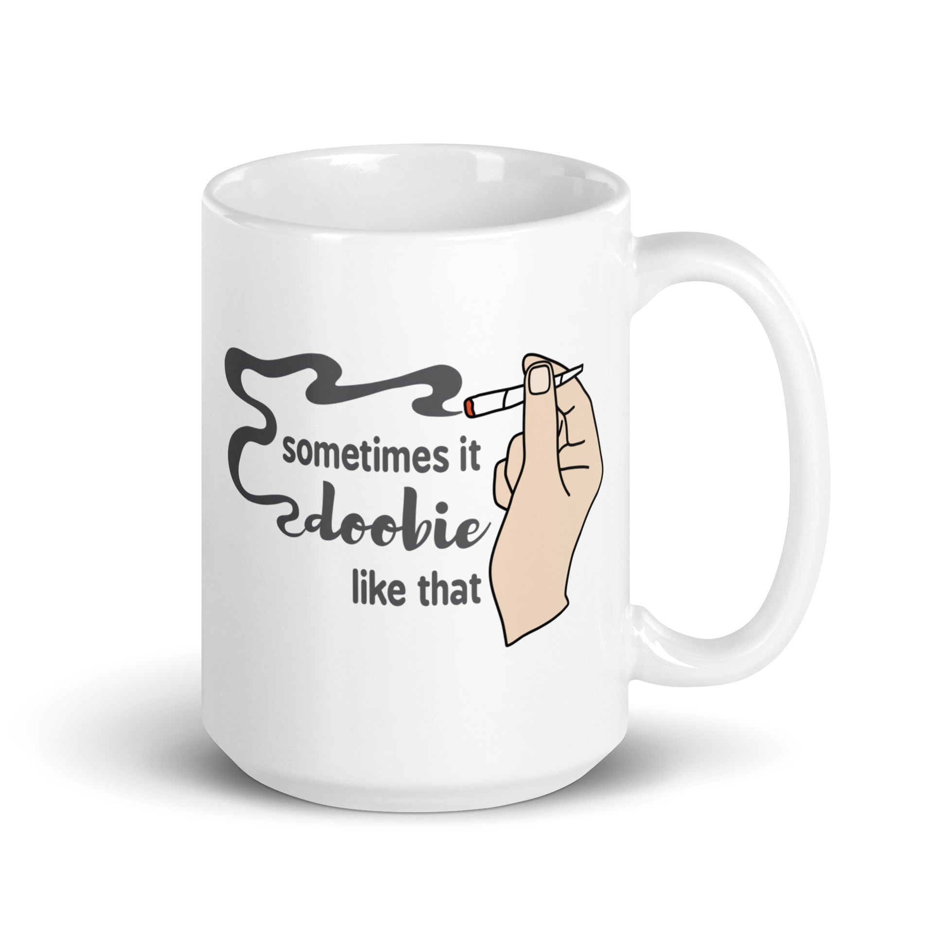 A white 15 ounce ceramic coffee cup featuring an illustration of a hand with light skin holding a joint. Text alongside the hand reads "sometimes it doobie like that" with the word "doobie" made from smoke from the joint.