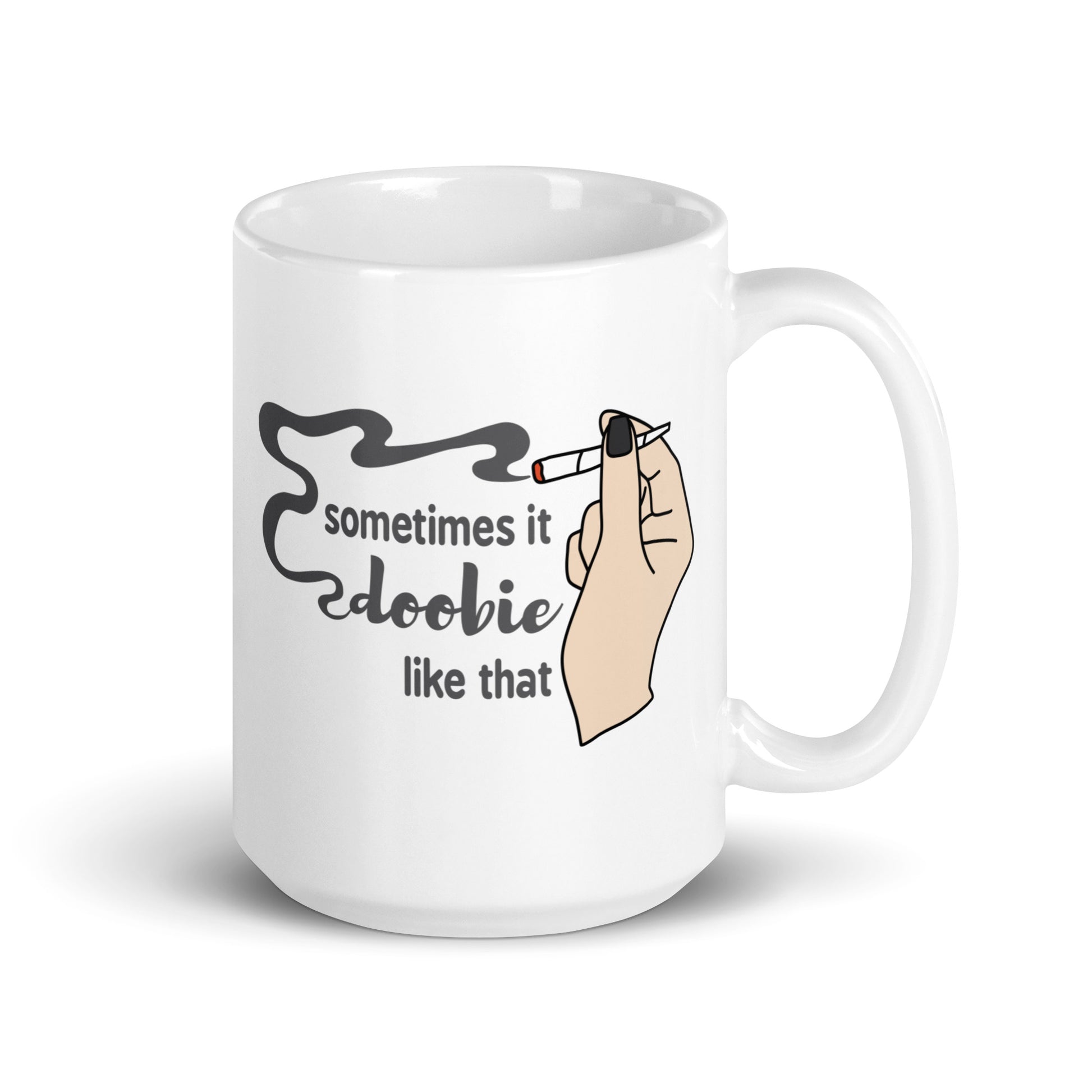 A white 15 ounce coffee mug featuring an illustration of a hand holding a smoking joint. Text alongside the hand reads "Sometimes it doobie like that" with the word "doobie" made of smoke from the joint.