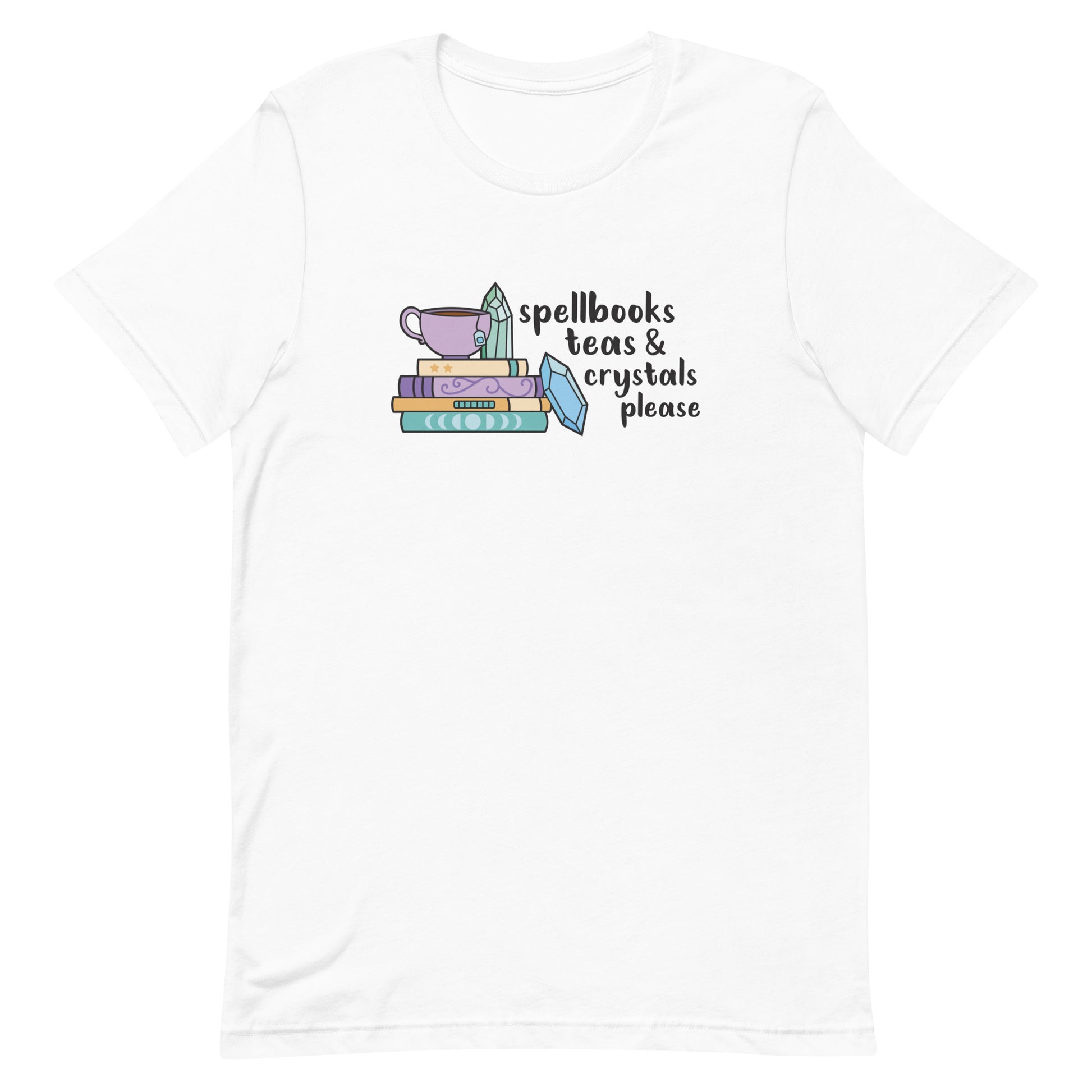 A white t-shirt featuring an illustration of a stack of spellbooks with a teacup resting on top. A few crystals are scattered around the books. Text alongside the illustration reads "Spellbooks, teas & crystals please"