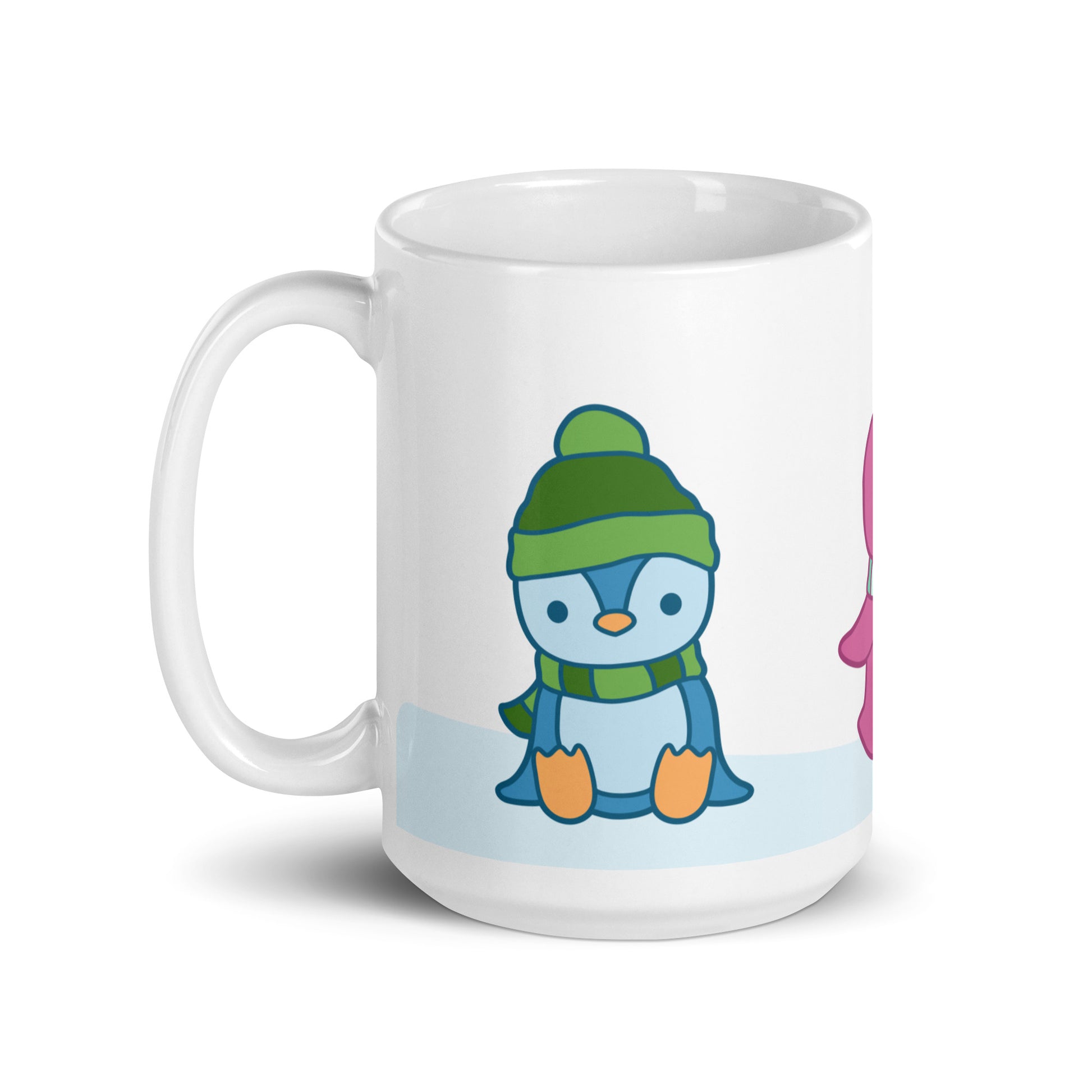 A white 15 ounce ceramic mug featuring an illustration of peguins in the snow. The primary visible penguin is blue, with a green hat.
