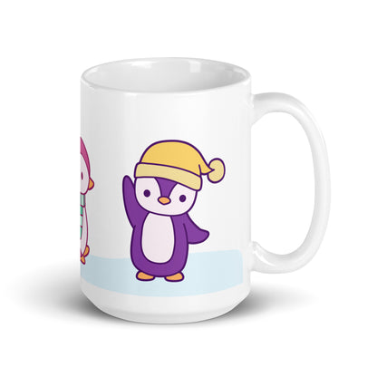 A white 15 ounce ceramic mug featuring an illustration of peguins in the snow. The primary visible penguin is purple, with a yellow hat.