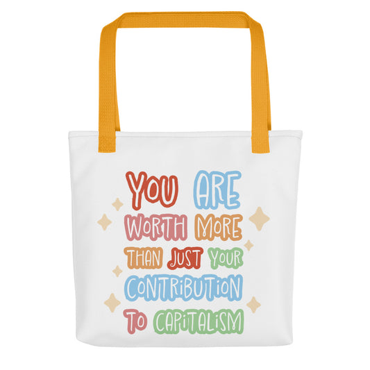 A white tote bag with yellow handles, featuring colorful hand-written-style text that reads "You are worth more than just your contribution to capitalism". Sparkles surround the text on each side.