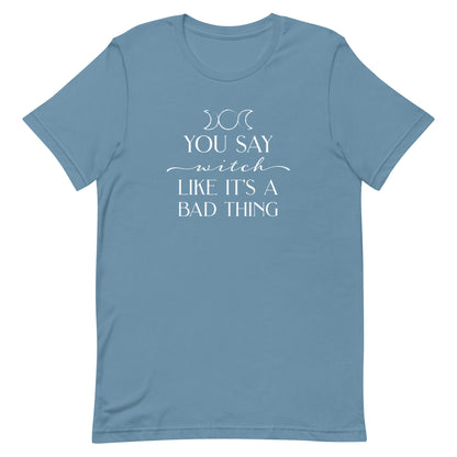 A blue crewneck t-shirt featuring the triple goddess symbol and text reading "You say witch like it's a bad thing"