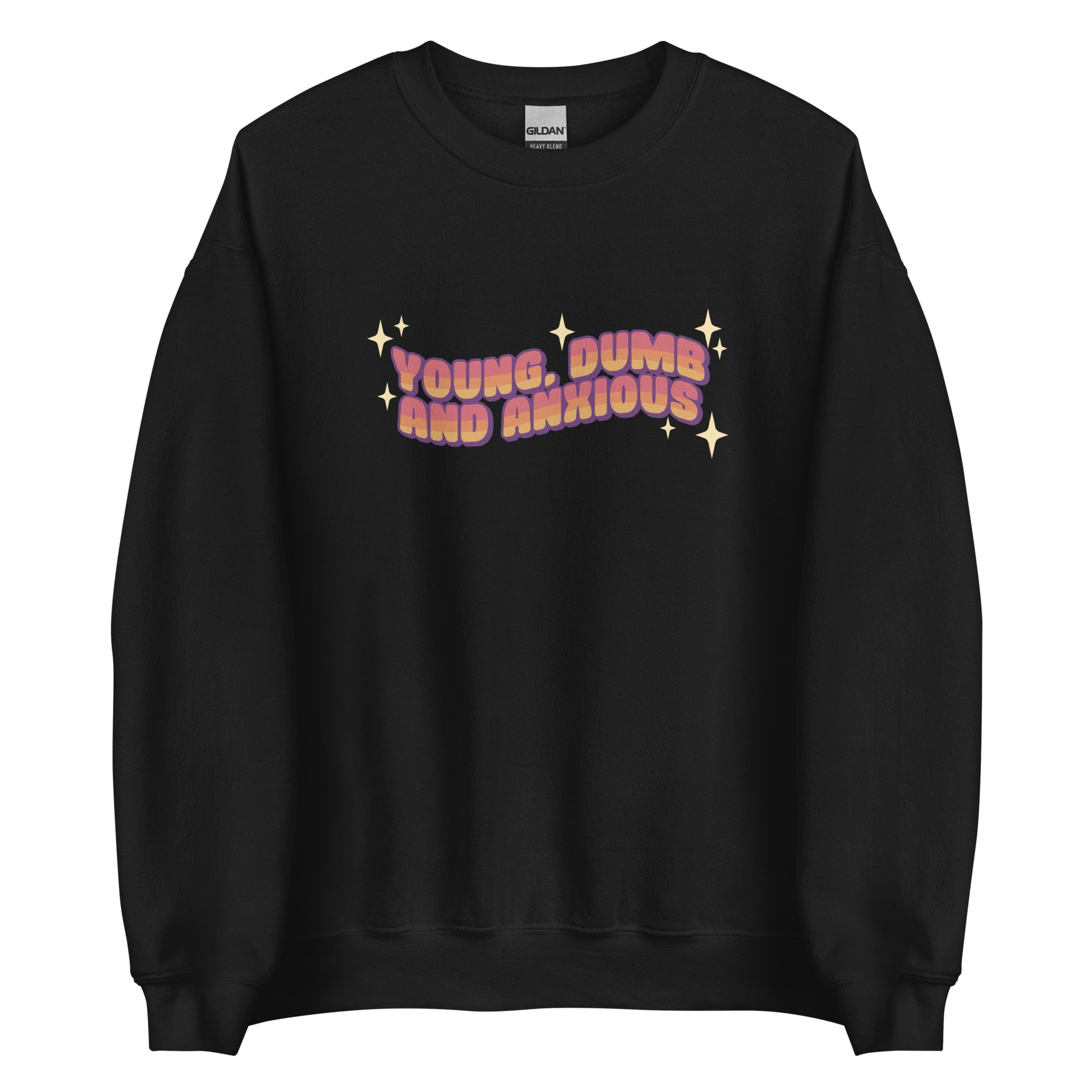 A black crewneck sweatshirt featuring text in a pink-to-yellow gradient, surrounded by sparkles. The text reads "Young, dumb and anxious" in a blocky font.