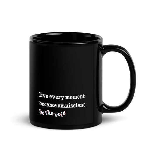 A black ceramic mug featuring white text that reads "live every moment, become omniscient, be the void" in an increasingly distorted font.