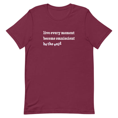 A maroon crewneck t-shirt featuring text reading "live every moment, become omniscient, be the void" in an increasingly distorted font.